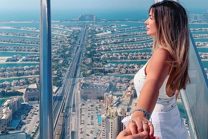 Experience sweeping views of Palm Jumeirah and the Arabian Gulf from 240 meters high offering a stunning perspective of Dubai's skyline and unique photo opportunities on the crystal-framed terrace.